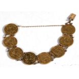 A half sovereign gold bracelet consisting of eight half sovereigns dated 1900, 1904, 1906, two 1907,