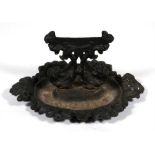 A cast iron boot scraper.