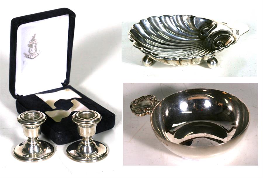 A silver wine taster, London 1965, a silver shell shaped pin dish, Chester 1899, and a pair of cased