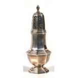 A silver sugar caster of octagonal form, Sheffield 1938, 19cm (7.5ins) high, (166g).