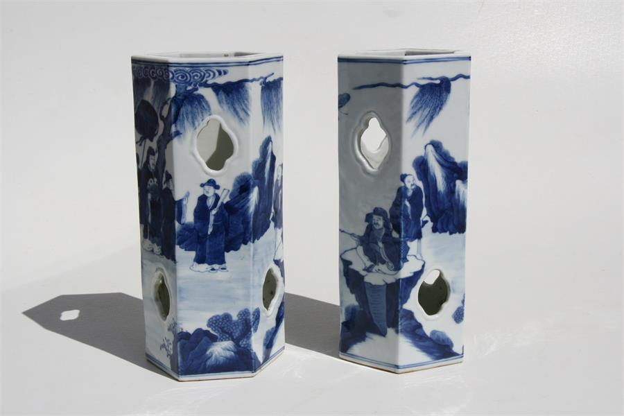 A pair of Chinese hexagonal form blue & white wig stands decorated with figures in a landscape, with - Image 6 of 8