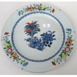 A Chinese doucai large shallow dish decorated with flowers in enamel colours, 39cms (15.25ins)
