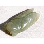 A Chinese jade carving in the form of a cicada, 5cms (2ins) wide. Condition Report Good condition