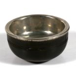 A Tibetan metal lined offering bowl, 15cm (6ins) diameter