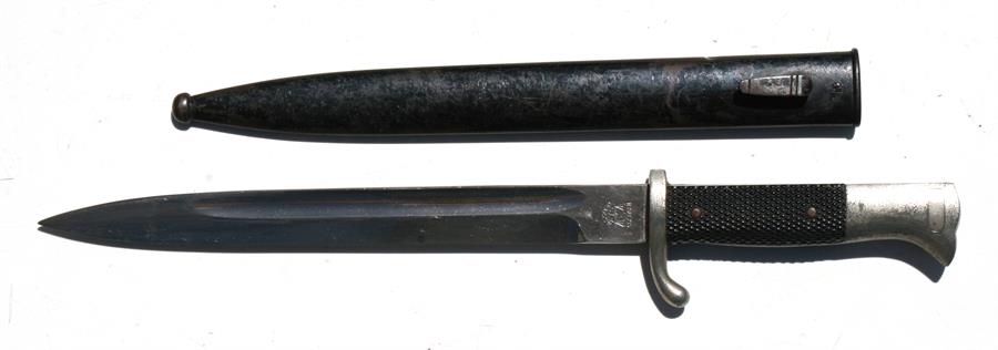 A WW2 German Nazi parade bayonet in its steel scabbard. Makers name to blade Alcoso ASC Solingen.