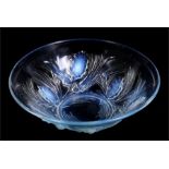 An early 20th century opalescent glass bowl decorated in relief with pine cones, 26cms (10.25ins)