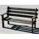 A teak slatted garden bench, makers plaque 'Branson', 150cms (59ins) wide.