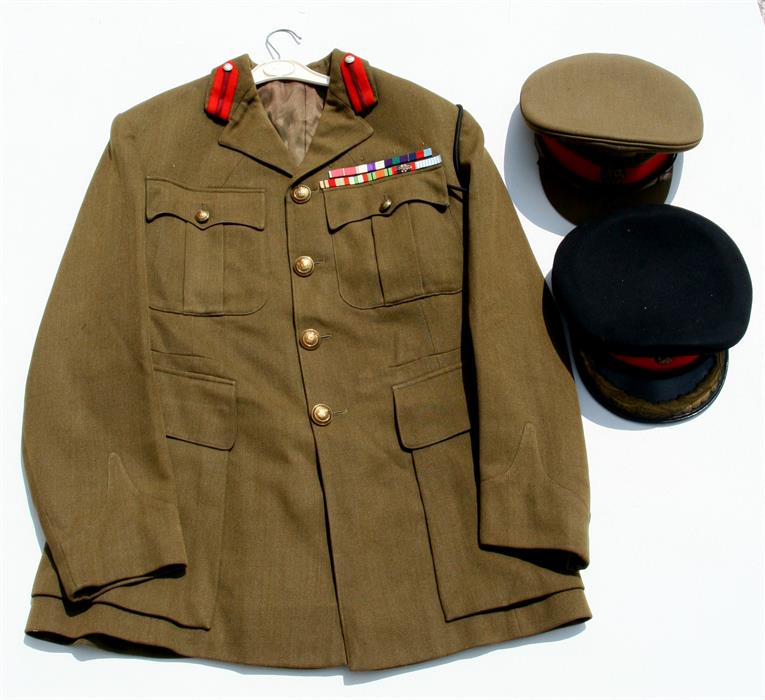 Colonel J.C. Denny, His Northamptonshire Regiment tunic and two boxed caps.