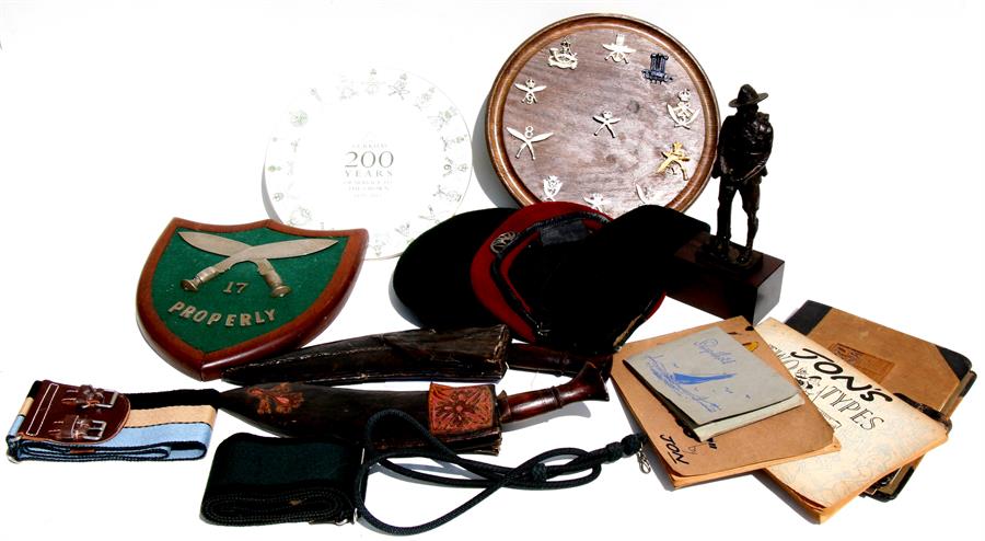 Lieutenant Colonel V. Robinson, six assorted GR berets, belts and various souvenirs of the