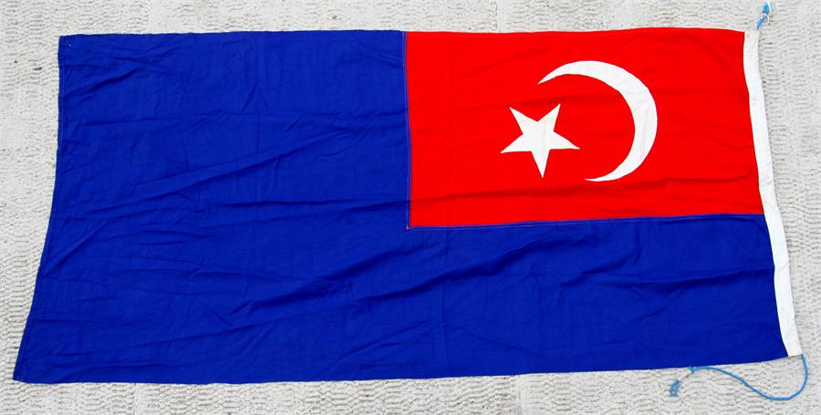 An original cotton flag to the Malaysian State of Johor. 84cms by 188cms (33ins by 74ins)