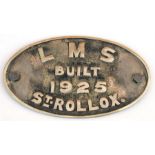 A brass railway plaque 'LMS Built 1925 St Rollox', 26cms (10.25ins) wide.