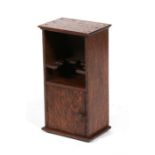 An early 20th century oak smoker's cabinet, 20cms (8ins) wide.