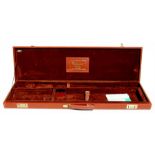 A Browning leather gun case, 86cms (3375ins) long.