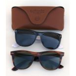 A pair of Ray Ban Wayfarer sunglasses; together with a cased pair of Catania sunglasses (2).