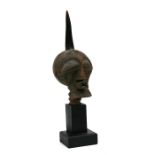 African / Tribal Art - A Songye carved wooden head on stand with copper decoration, 56cms (22ins)