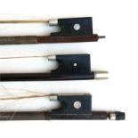 Three violin bows with mother of pearl inlaid frogs (3).