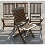 A set of four teak folding garden chairs (4).