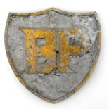 A cast aluminium shield shaped 'BP' wall plaque, 25cms (9.75ins) high.