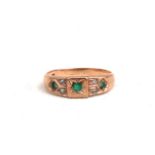 An Edwardian style 9ct gold emerald set ring, approx UK size O.