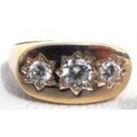 A 9ct gold ring set with three white stones, approx UK size R.