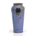 A Royal Doulton vase decorated with flowers, initialled to the base for Lily Partington, 18cms (