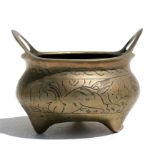 A Chinese two-handled censer decorated with fo dogs, 12cms (4.75ins) diameter.