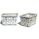 A pair of Chinese rectangular form planters decorated with butterflies in enamel colours with gilt