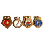 Four hand painted plaster ships crests or plaques mounted on wooden shields to HMS Exeter, HMS