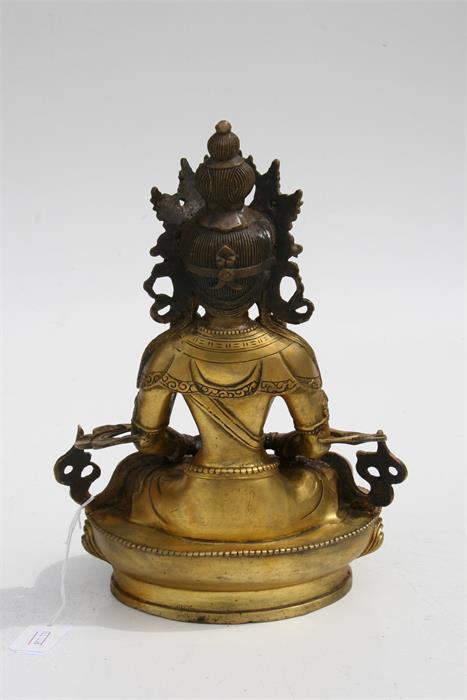 A large gilt bronze figure of a seated Buddha, 28.5cms (11.2ins) high. - Image 4 of 6