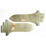 A pair of Chinese jade archaic style dagger blades, 15cms (6ins) long (2).