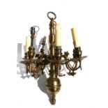 A seven-arm continental style brass ceiling light.