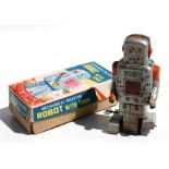 A Japanese tin plate mechanical walking robot with spark (working), in original box, 17cms (6.75ins)