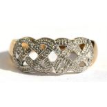 A 9ct gold Celtic knot design diamond set ring, approx UK size 'P'.