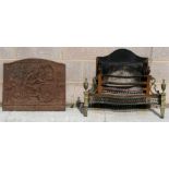 A cast iron fire back decorated in relief with figures, 61cms (24ins) wide; together with a cast &