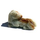 A Chinese mutton jade figure in the form of a recumbent horse, 7.5cms (3ins) long. Condition