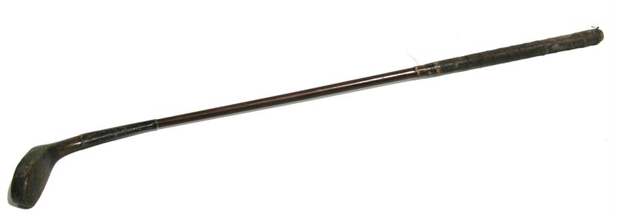 A 19th century long nosed putter golf club, 88cms (34.5ins) long.