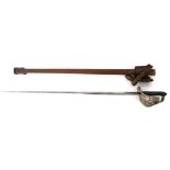 A WWI George V Infantry officers sword in leather scabbard and Sam Browne leather frog. Having a