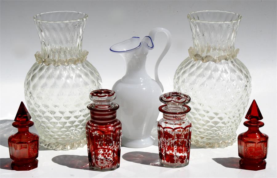 A pair of 19th century continental glass vases, 30.5cms (12ins) high; together with a pair of ruby