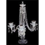 A bohemian glass three-arm candelabrum, 54cms (21ins) high.