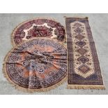 Two machine made Belgium silk effect circular rugs with central medallion within a foliate border on