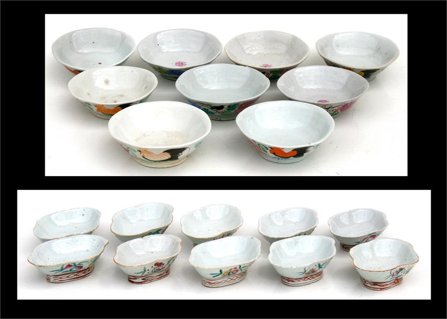 A quantity of Chinese bowls decorated with birds and flowers.