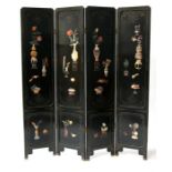 A 20th century Chinese black lacquer four-fold screen, one side inlaid with hardstone and