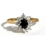 A 9ct gold sapphire set cluster ring, approx UK size 'M'.