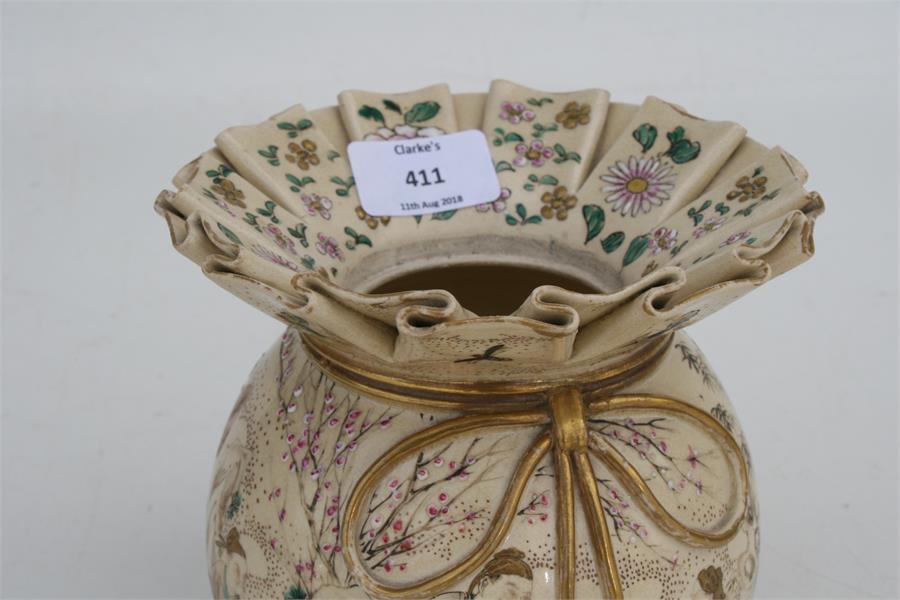 A late 19th century Japanese Satsuma vase in the form of a tied bag, decorated with figures in a - Image 2 of 4