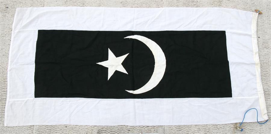 An original cotton flag to the Malaysian State of Terengganu. 81cms by 182cms (33ins by 72ins)