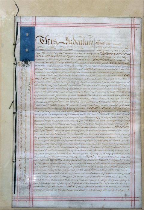 A Victorian Irish Indenture, stamped 'Dublin 22.3.75', framed & glazed, 34 by 51cms (13.25 by