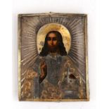 A Russian silver gilt mounted icon of Christ. 7 by 9cm ( 2.75 by 3.5ins)