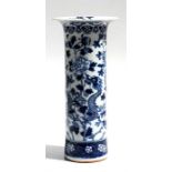 A 19th century Chinese blue & white sleeve vase decorated with a dragon amongst foliage (