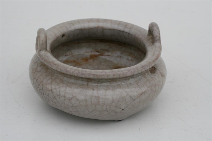A Chinese crackle glaze two-handled censer of compressed circular form, 12cms (4.75ins) diameter. - Image 7 of 8
