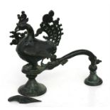 An Indian bronze censer in the form of a stylised bird and a dragon, 28cms (11ins) high.